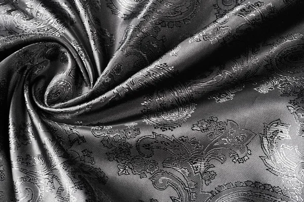 Textura, fundo, tecido cinza de aço preto com um patt paisley — Fotografia de Stock