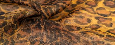 doku, ipek kumaş, leopar deri, kahverengi-sarı siyah tonları,