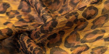 doku, ipek kumaş, leopar deri, kahverengi-sarı siyah tonları,