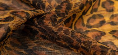 doku, ipek kumaş, leopar deri, kahverengi-sarı siyah tonları,
