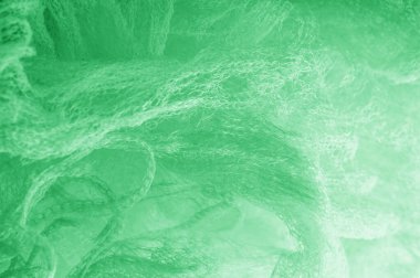 Örgü yeşilli kumaş. Sizin için ruhani parlaklık bir çizgi ekleyin