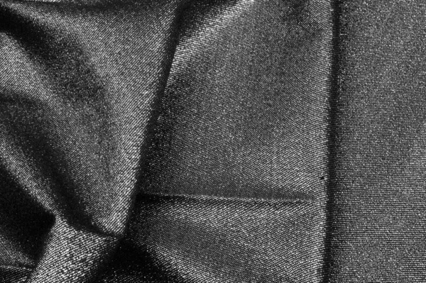 Texture, fond, motif. Tissu Gris noir enduit d'un met — Photo