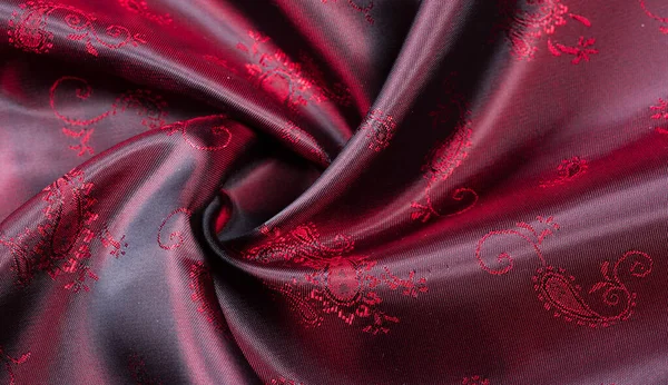 Texture, fabric, red silk with paisley pattern. This beautiful p