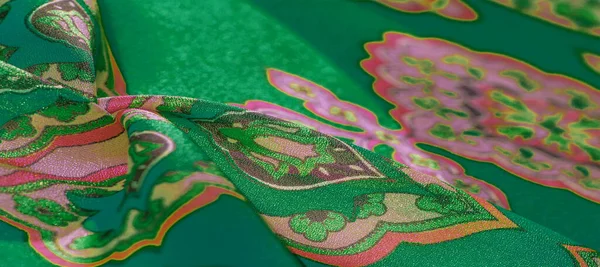 Textura, fundo, tecido de seda multicolorido com um padrão de — Fotografia de Stock