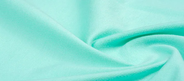 Textur, bakgrund, mönster. Tyget är stickad blå, turqu — Stockfoto