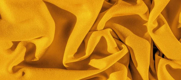 Текстура, фон, шелковая ткань, желтый женский носовой платок; D — стоковое фото
