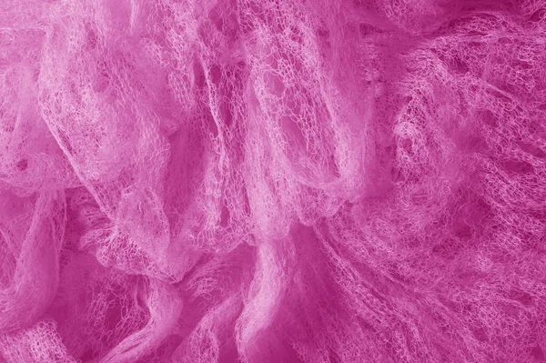 Fabric in a mesh of pink color. this is a micro-thin mesh, which