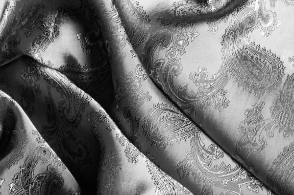 Textura, fondo, tela gris acero negro con un paisley patt — Foto de Stock