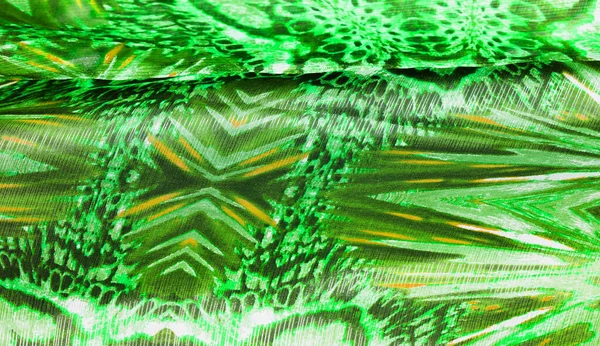 Background texture, pattern. Silk from a greenish emerald shade.