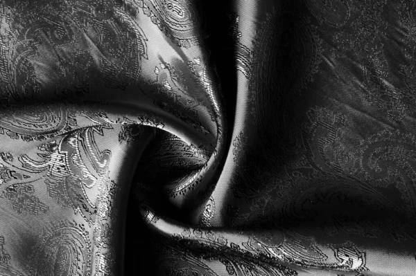 Textur, bakgrund, svart stål grå tyg med en Paisley Patt — Stockfoto