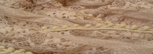 Текстура, фон, рисунок, бежевый шелк, женственный, гофрированный N — стоковое фото