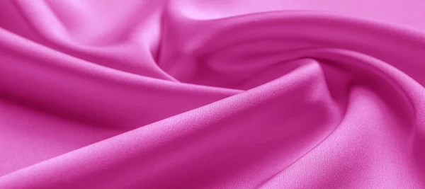 Υφή. Ροζ μεταξωτό ύφασμα. λαμπρή λάμψη και χαρακτηριστική — Φωτογραφία Αρχείου