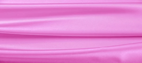 texture. Pink silk fabric. brilliant luster and characteristic
