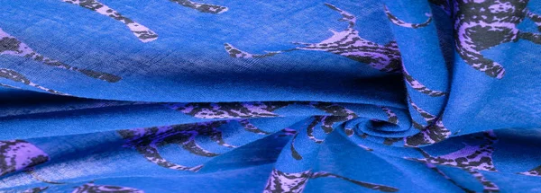 Текстура, фон, бавовняна тканина синього кольору з принтом — стокове фото