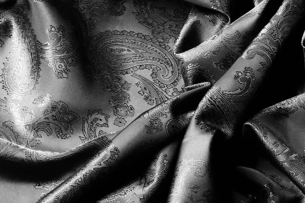 Textur, bakgrund, svart stål grå tyg med en Paisley Patt — Stockfoto