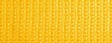 Arka plan dokusu, desen. Metalik payetler ile sarı kumaş