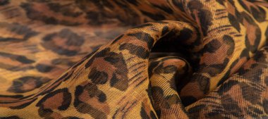 doku, ipek kumaş, leopar deri, kahverengi-sarı siyah tonları,