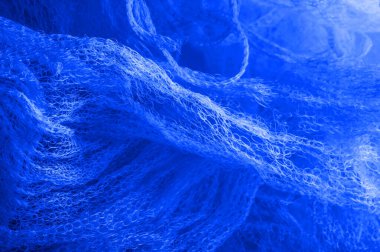 Doku arka planı, desen. bir örgü mavi kumaş, güzel bir 