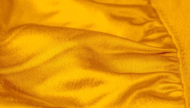 sarı doku ile bebek bezi. Bu çok yönlü kumaşın birçok kullanımı vardır,