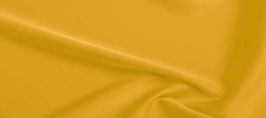 arka plan dokusu, desen. Sarı ipek kumaş. Çok hafif bir fa