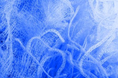 Doku arka planı, desen. bir örgü mavi kumaş, güzel bir 