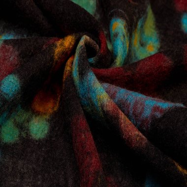 Doku, arka plan, renkli tereyağı ile siyah yün kumaş