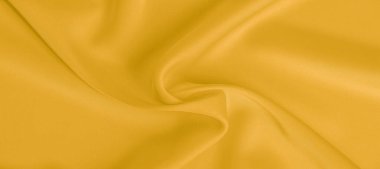 arka plan dokusu, desen. Sarı ipek kumaş. Çok hafif bir fa