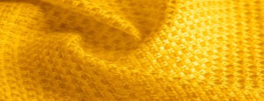 Arka plan dokusu, desen. Metalik payetler ile sarı kumaş