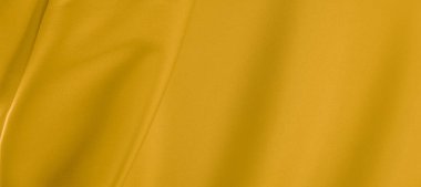 arka plan dokusu, desen. Sarı ipek kumaş. Çok hafif bir fa