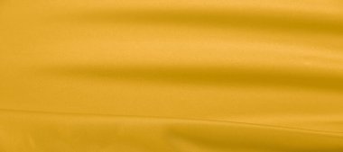 arka plan dokusu, desen. Sarı ipek kumaş. Çok hafif bir fa