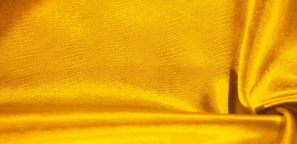 Textura, fundo, padrão, tecido de seda em amarelo. Este adorab — Fotografia de Stock