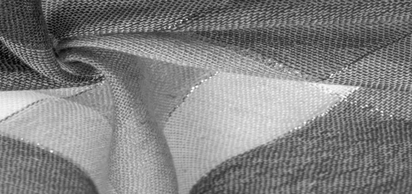 Textura, fondo, bufanda de seda femenina en blanco y negro con un — Foto de Stock