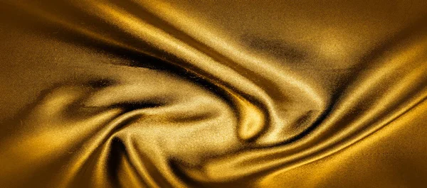Текстура, фон, візерунок. золота жовта шовкова тканина панорами — стокове фото