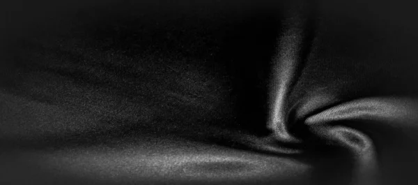 Texture, background, pattern. Black silk fabric. It is black and — Stock Photo, Image