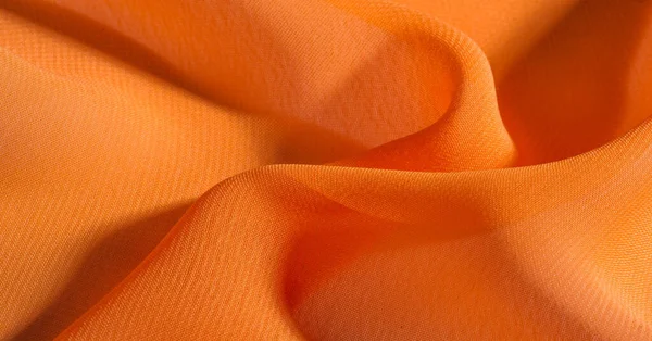 Latar belakang, pola, tekstur, kain sutra oranye memiliki brilian — Stok Foto