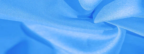 Textur, Hintergrund, Muster, durchgehender hellblauer Seidensatinstoff — Stockfoto
