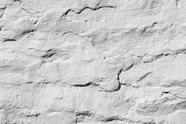 Textuur achtergrond, patroon. De muur is bekleed met graniet Ston — Stockfoto