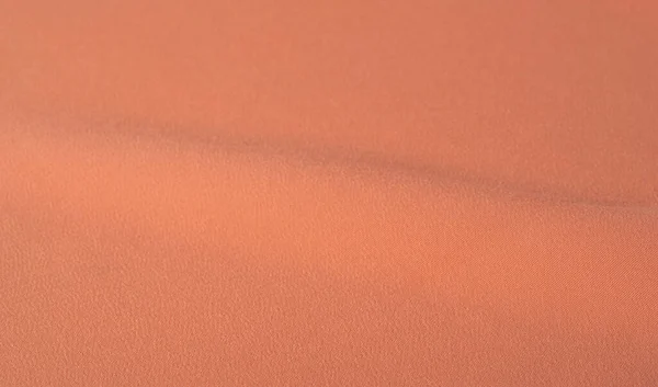 Bild textur, bakgrund orange sidentyg. Den har en wonderf — Stockfoto
