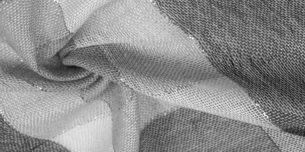 Textura, fondo, bufanda de seda femenina en blanco y negro con un —  Fotos de Stock