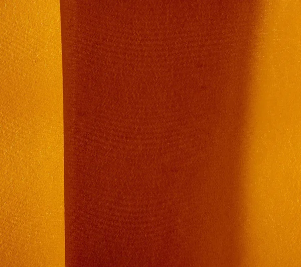 Bild textur bakgrund gul fördomsfull gul silk tyg — Stockfoto