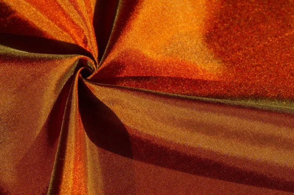 Textuur van briefkaart achtergrond, zijde stof van bruin tot goud — Stockfoto