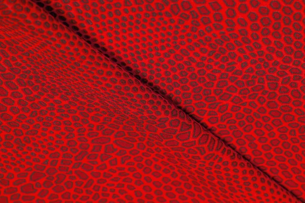 Red silk fabric, animal skin. All projects are new and designed — Stock Photo, Image