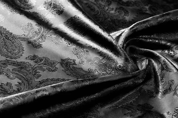 Texture, fond, tissu gris acier noir avec une patte paisley — Photo
