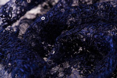 Doku, desen, beyaz bir arka plan üzerinde dantel mavi. Narin ve 