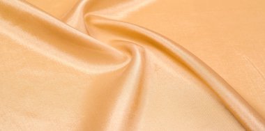 Şekil, arka plan, desen. Açık kahverengi ipek kumaş. Bu th