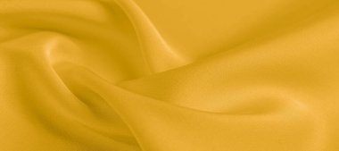 arka plan dokusu, desen. Sarı ipek kumaş. Çok hafif bir fa