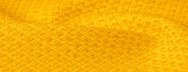 Arka plan dokusu, desen. Metalik payetler ile sarı kumaş
