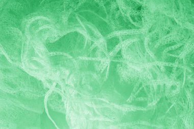 Örgü yeşilli kumaş. Sizin için ruhani parlaklık bir çizgi ekleyin