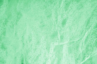 Örgü yeşilli kumaş. Sizin için ruhani parlaklık bir çizgi ekleyin