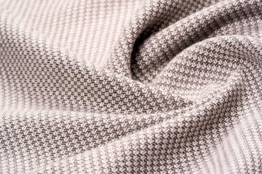 Arkaplan desenli kumaş dikişli kahverengi iplikli sıcak yün. Bu kahverengi yün kumaş sana çok yakışacak. Güzel bir tasarım ortamı ve daha fazlasını yaratmak için eşleştir ve karıştır